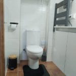Toilet in bathroom of Casa do Bairro